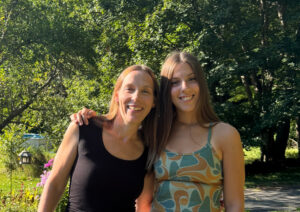 Portrait of a college graduate with her mom